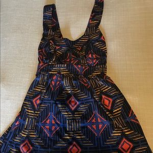 Sleeveless summer top with tie around waist